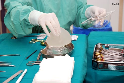 medical professional with operating tools and breast implants-img-blog
